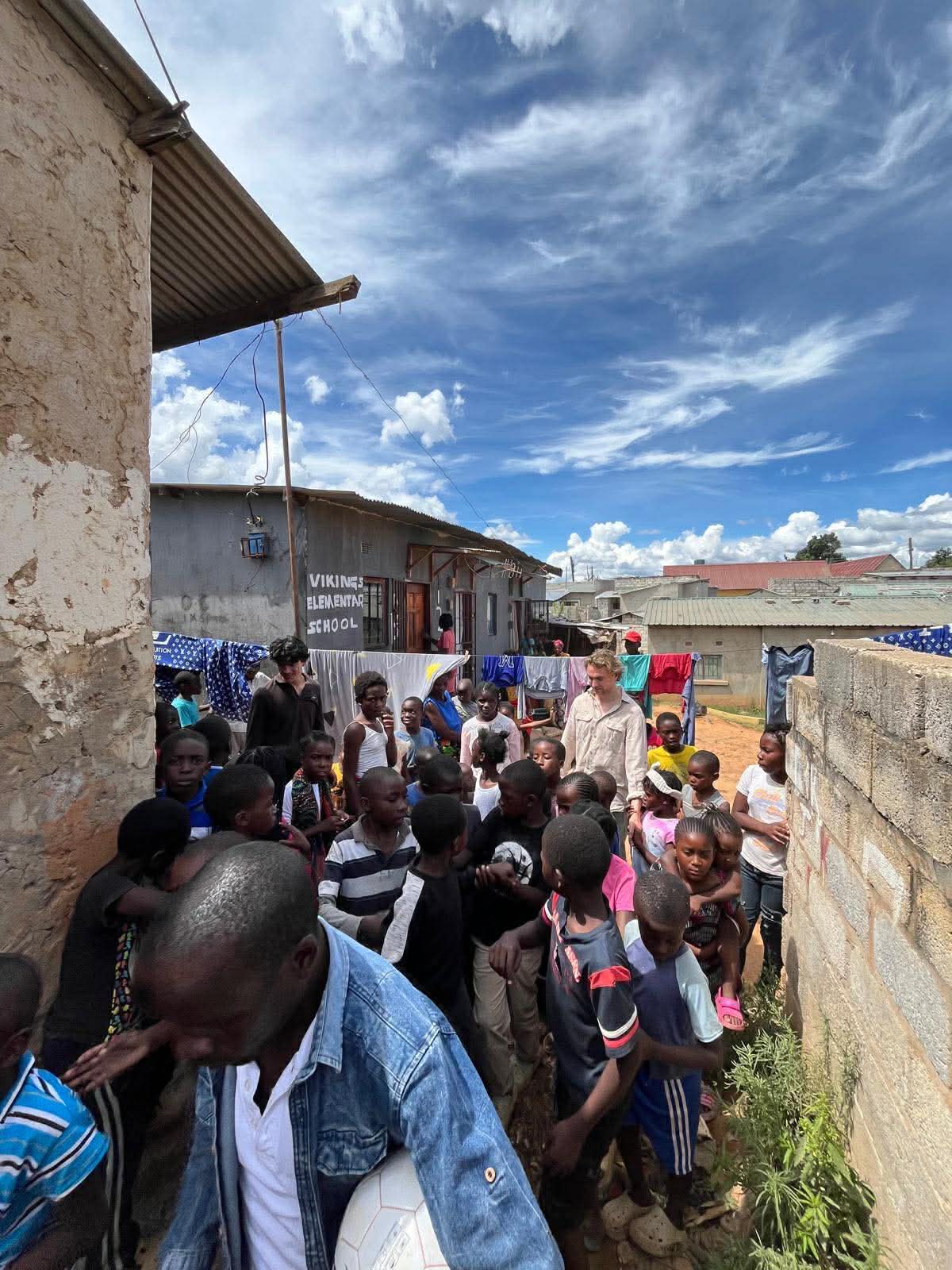 The community gathered outside the school